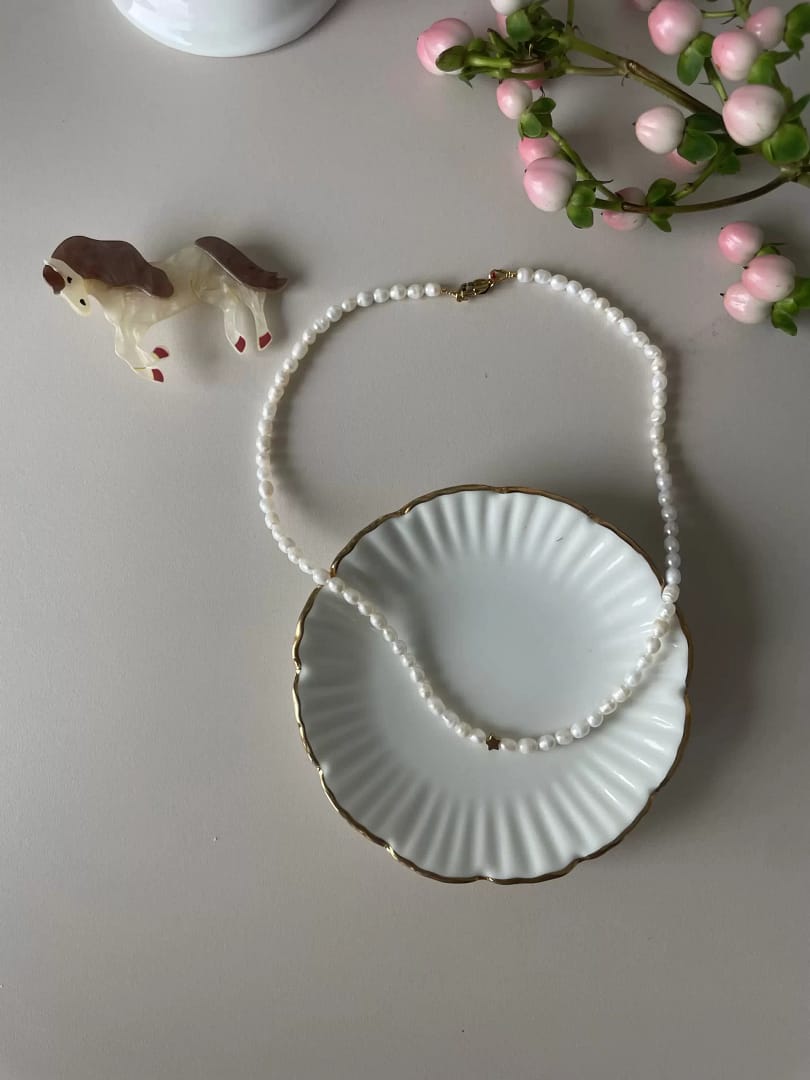 Dětský perlový náhrdelník mamé.